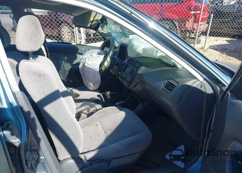 2000 Honda Civic Lx from USA, damaged, VIN 1HGEJ6571YL037355